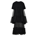 Black short-sleeve dress with a crewneck bodice, sheer mesh panels, and tiered ruffles, front view.