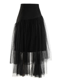 Back view of a black layered mesh skirt with an irregular sheer hem.