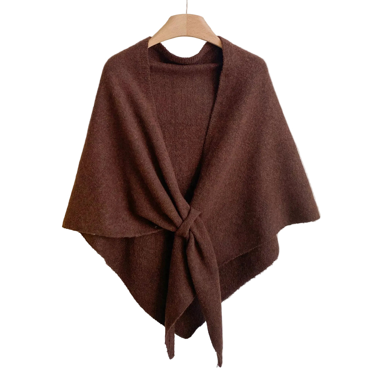 Brown knitted wrap shawl with long front ties crossed together, displayed on a hanger.