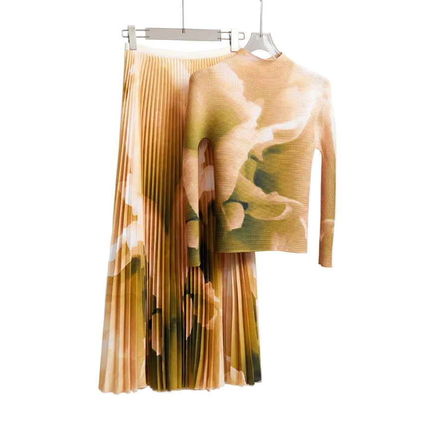 Beige and olive abstract-print high-neck long-sleeve top with matching pleated midi skirt on hangers.