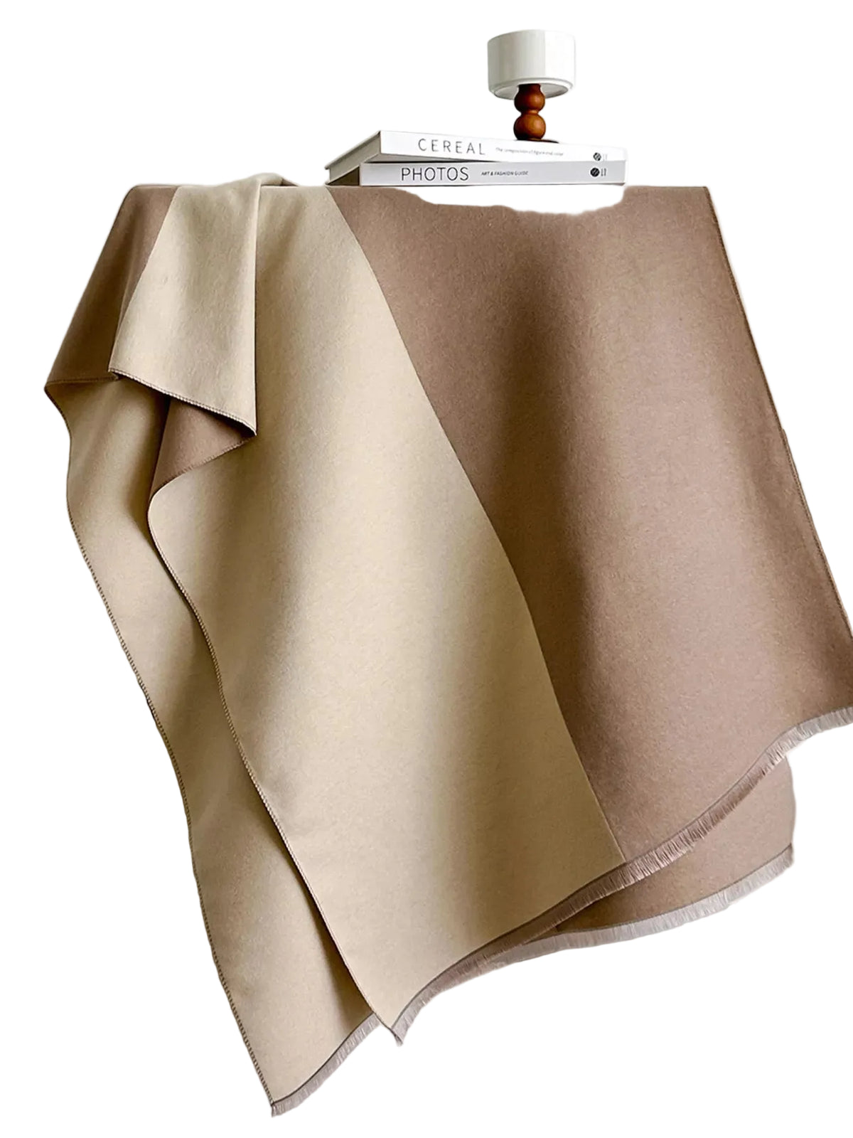Beige and taupe two-tone scarf spread over a chair, showing its panels and short fringed edge.