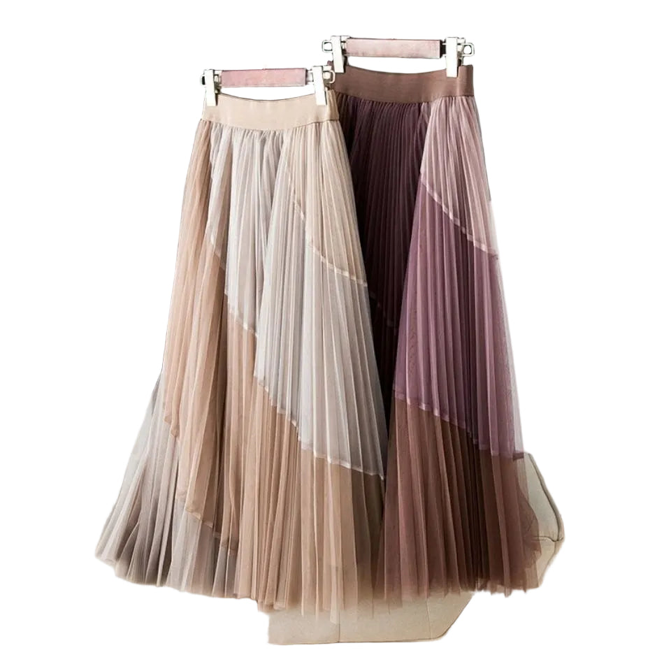 Beige and mauve color-block pleated midi skirts displayed side by side on hangers.