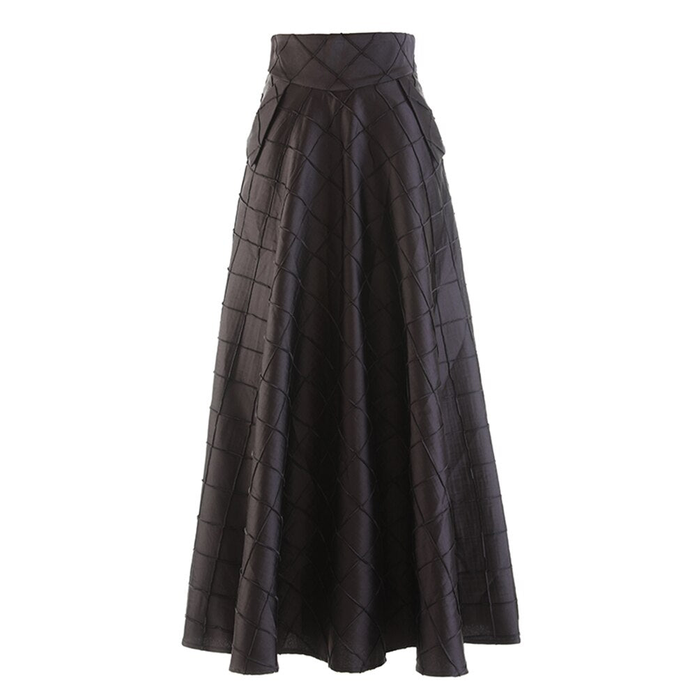 Black A-line skirt with a wide waistband and raised diamond pattern, front view.