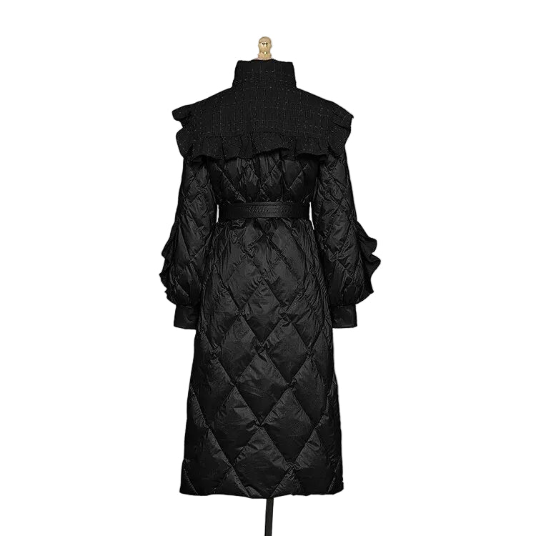 Back view of a black diamond-quilted long coat with a ruffled shoulder yoke and waist tie.