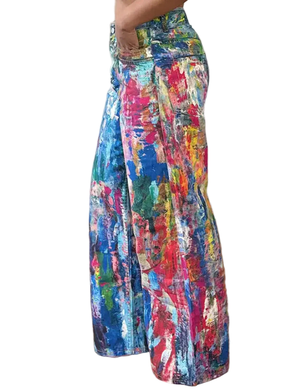 Side view of multicolor abstract paint-print wide-leg pants, showing a patch pocket and loose legs.