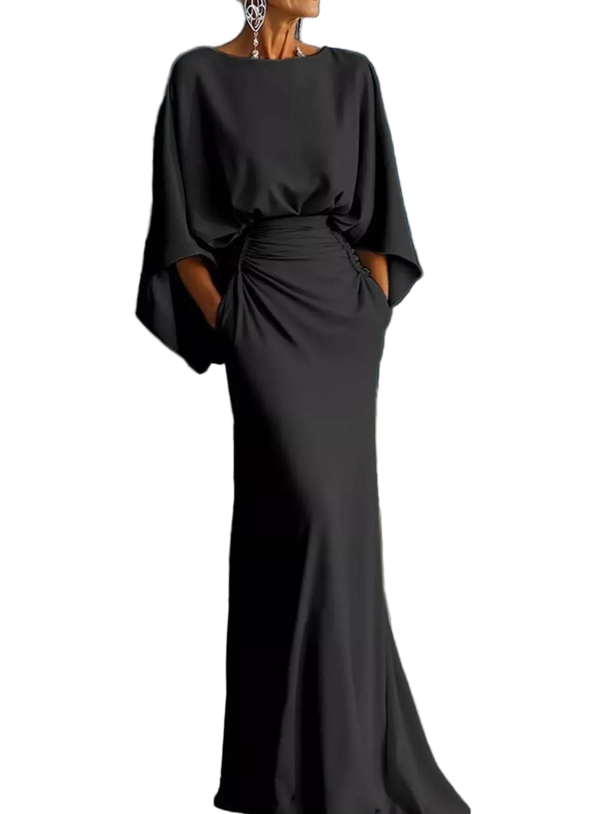 Model wearing a black gown with wide draped sleeves, a ruched waist, and a flared floor-length skirt.