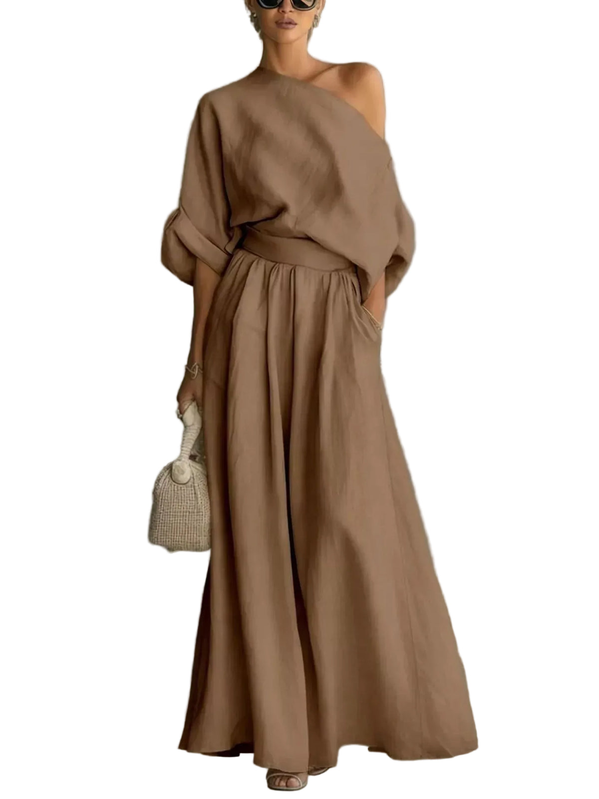 Model wearing a tan one-shoulder draped top and matching gathered-waist wide-leg pants, front view.