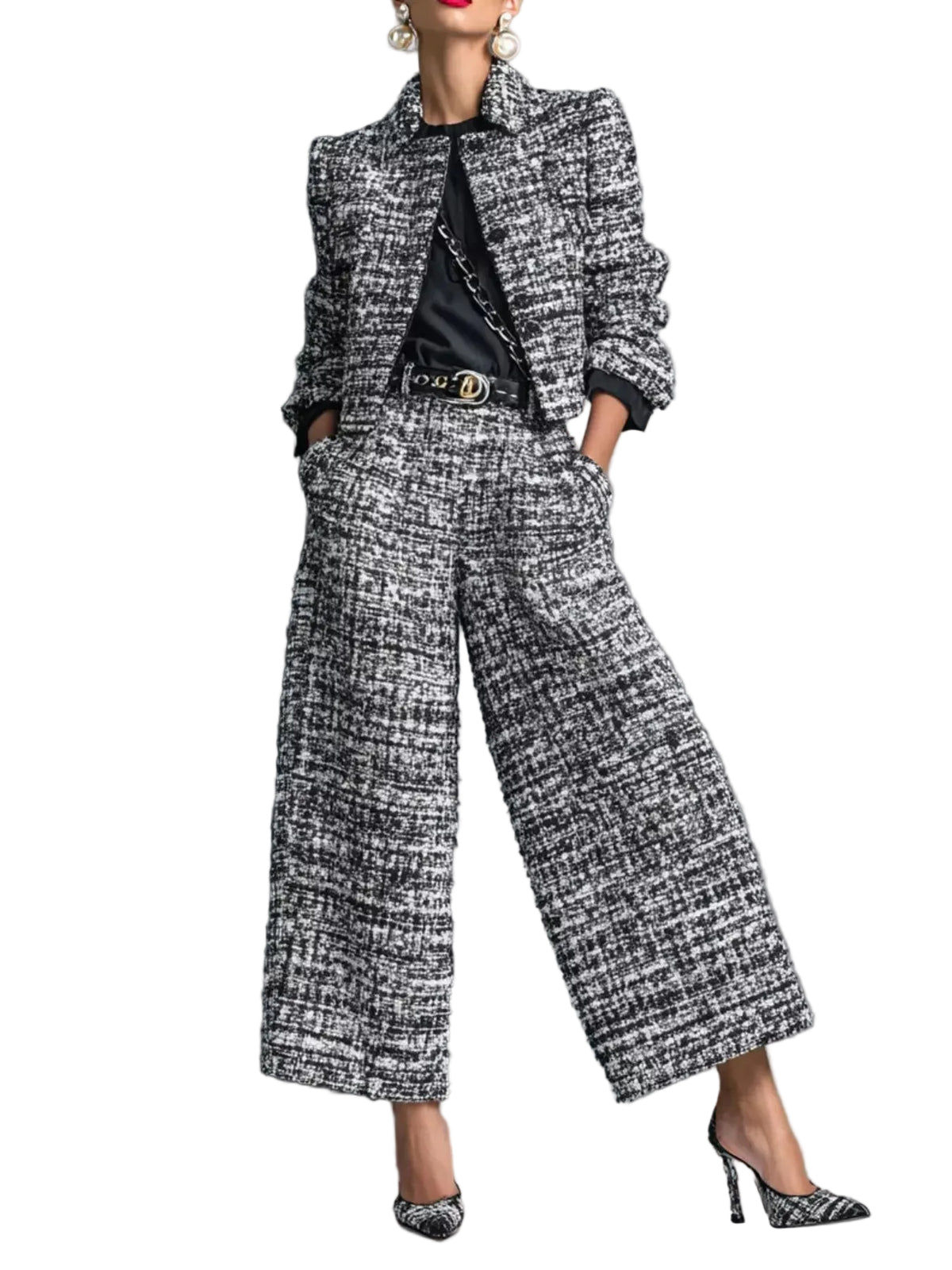Model wearing a black and white textured cropped jacket and matching wide-leg cropped pants, front view.
