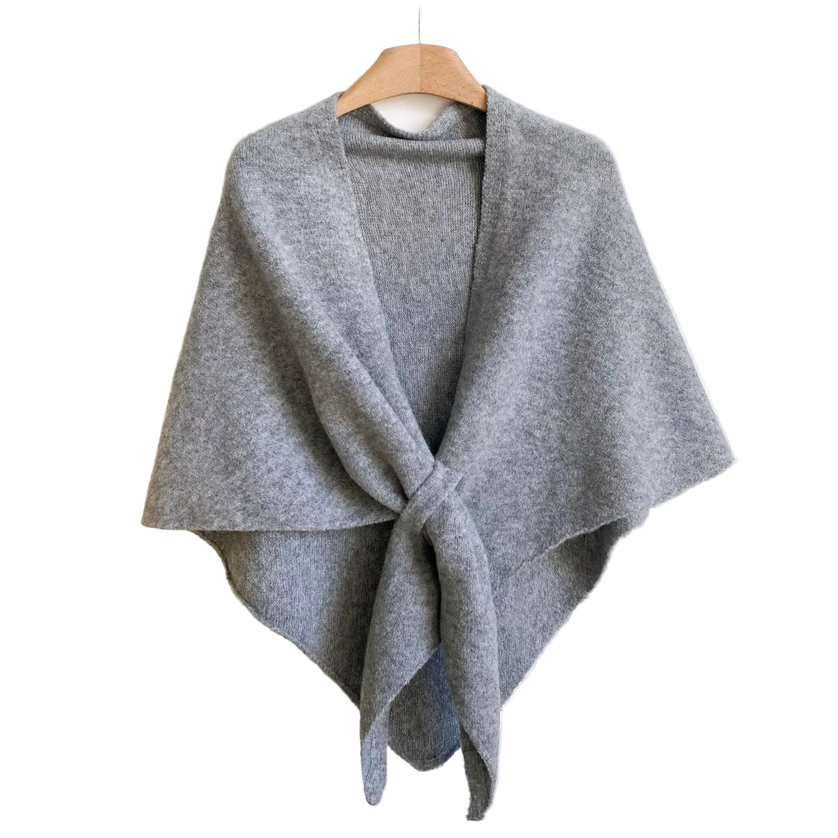 Light gray knitted wrap shawl with long front ties crossed together, displayed on a hanger.