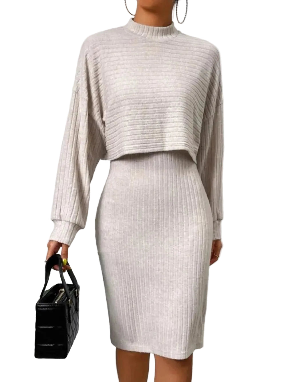 Model wearing a cream cropped mock-neck sweater over a matching ribbed knee-length dress, front view.