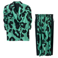 Jade green and black animal-print puff-sleeve blazer and matching skirt with black side panels, front view.