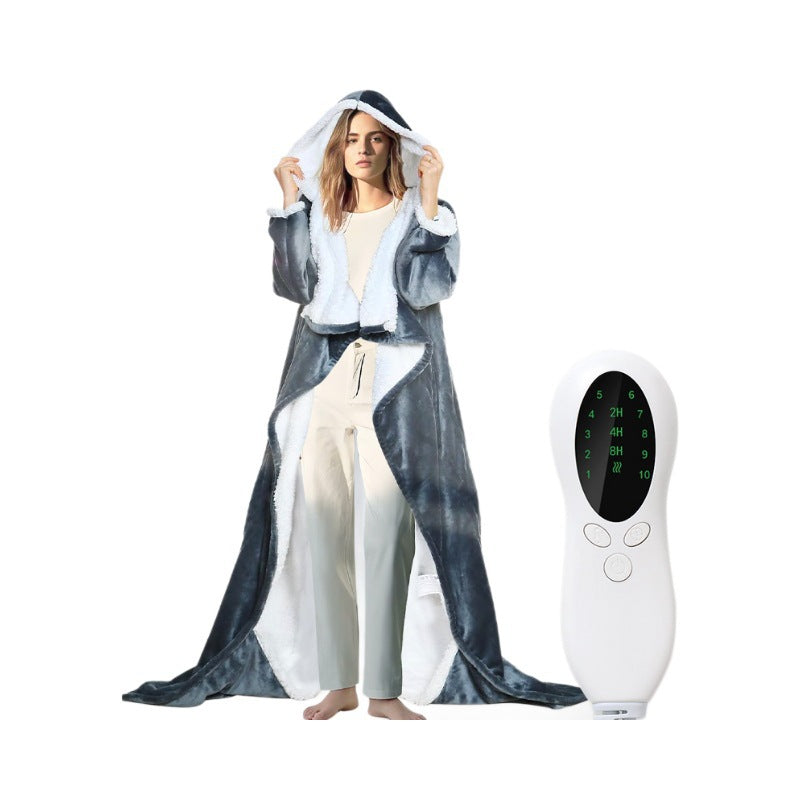 Model wearing an open gray hooded wearable blanket with pale lining beside an enlarged handheld controller.