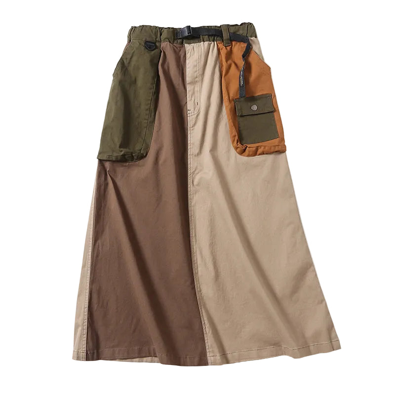 Brown and beige color-block cargo skirt with olive and mustard patch pockets and a buckle belt, front view.
