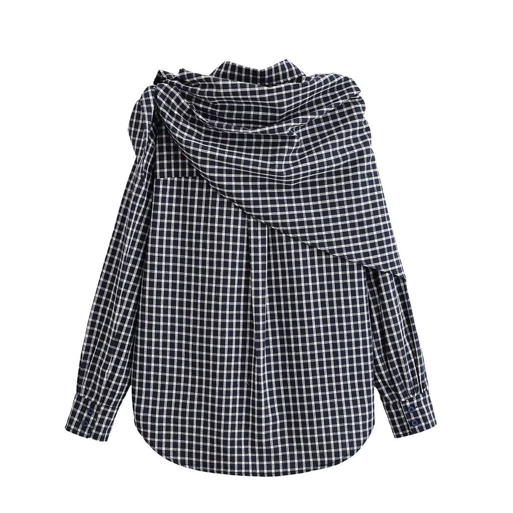 Back view of a black and white checked shirt with a matching scarf draped across the shoulders.