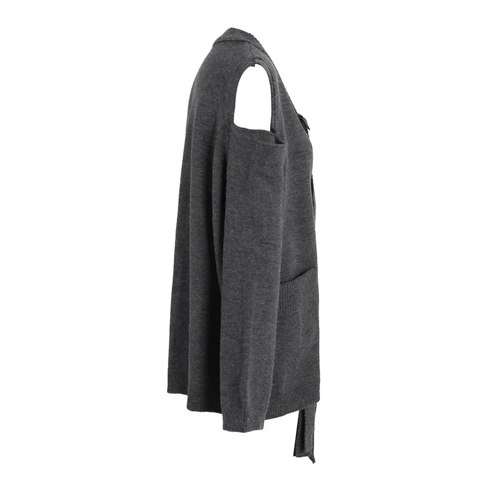 Side view of a dark gray sweater showing the open shoulder, long sleeve, and front patch pocket.