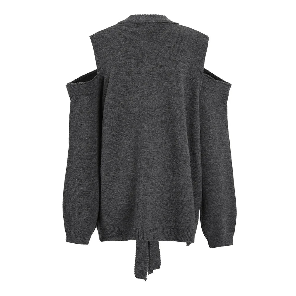 Back view of a dark gray cold-shoulder sweater with long sleeves and a ribbed hem.