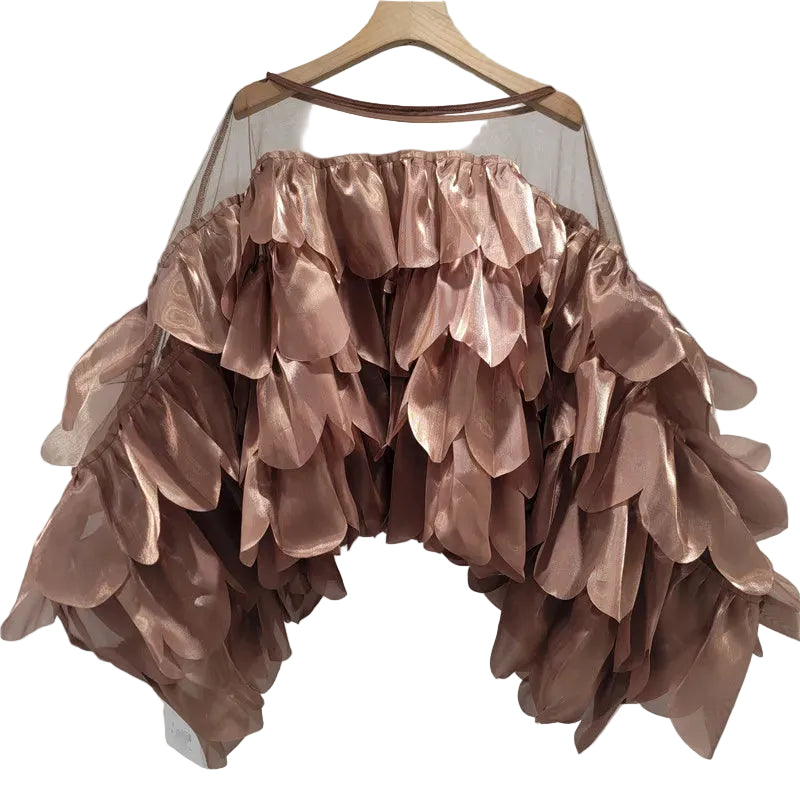 Taupe sheer blouse with layered petal details and wide bell sleeves, hanging front view.