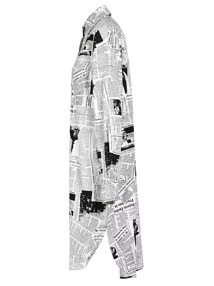Side view of a white newspaper-print longline shirt showing the curved split hem.