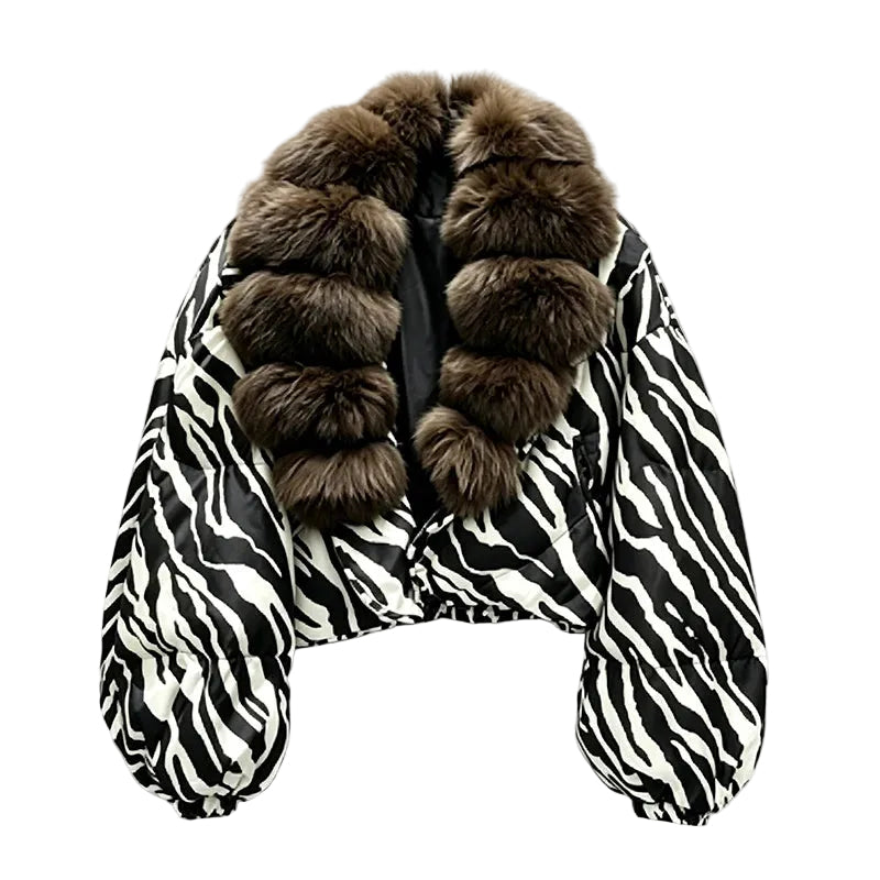 Black and white zebra-print cropped jacket with a thick brown fluffy collar and balloon sleeves, front view.