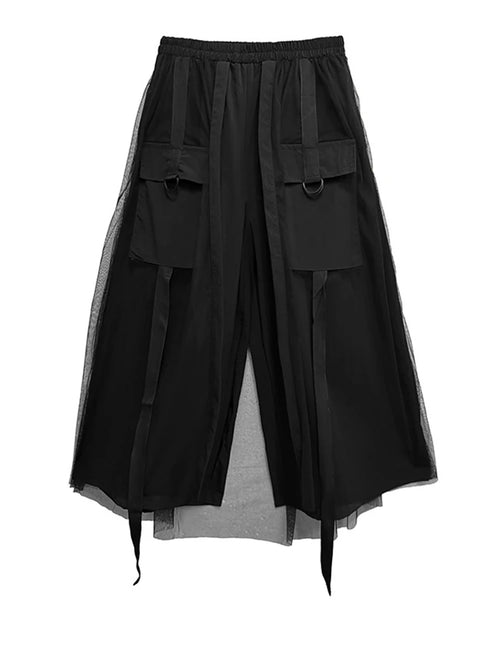 Black wide-leg cargo pants with sheer mesh overlays, flap pockets, rings, and hanging straps, product view.