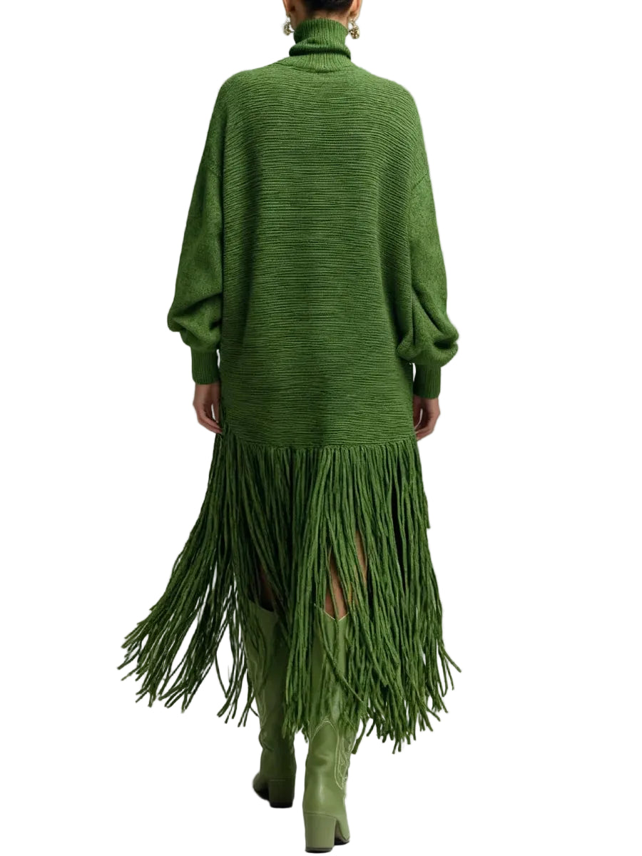 Back view of a green turtleneck sweater dress with long sleeves and a long fringe hem.