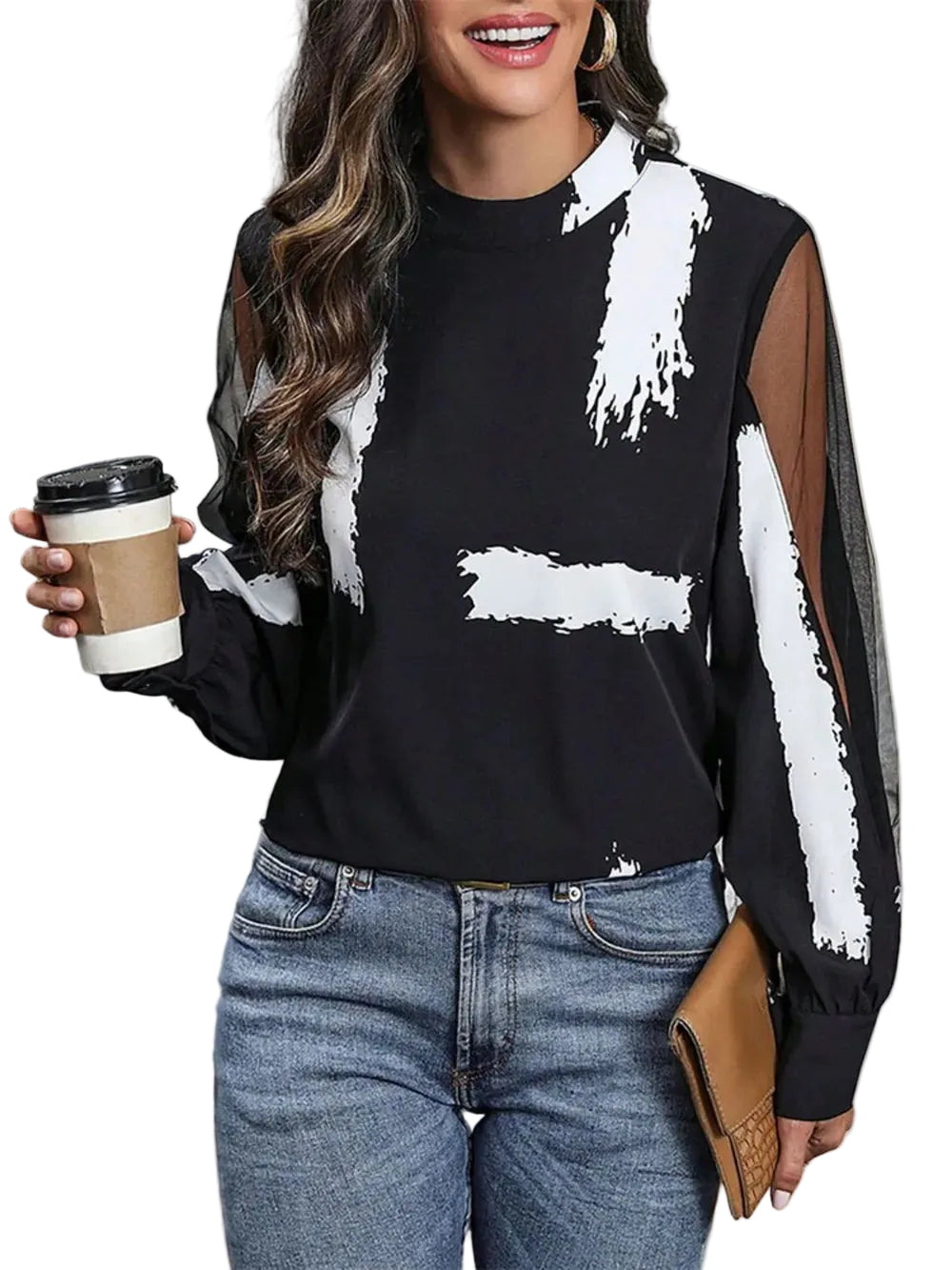 Model wearing a black mock-neck blouse with white brushstroke print and sheer sleeve panels, front view.