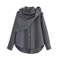 Black and white checked button-front shirt with a draped matching scarf tied at one shoulder, front view.