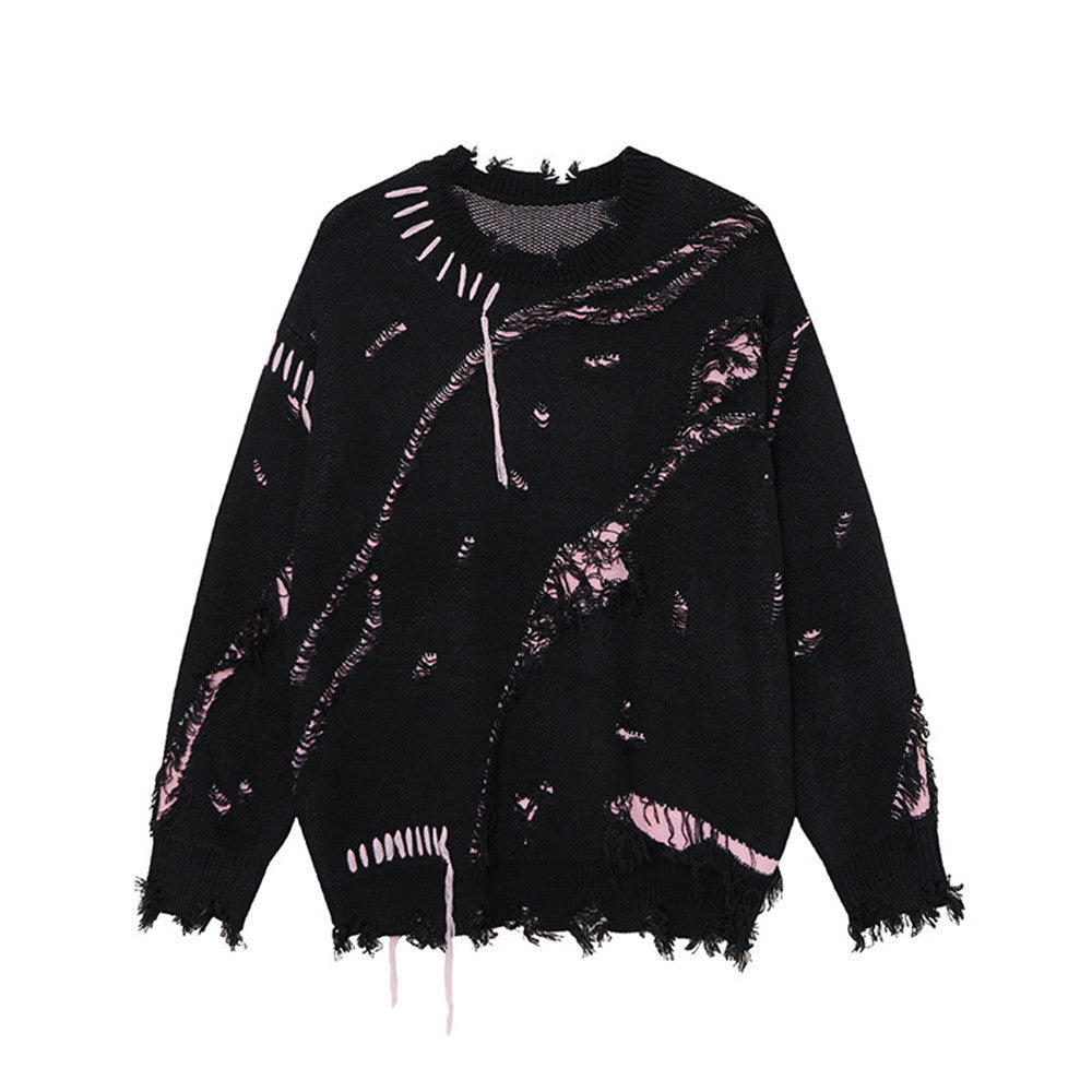 Black distressed sweater with pink accents, loose threads, and frayed neckline, cuffs, and hem, front view.