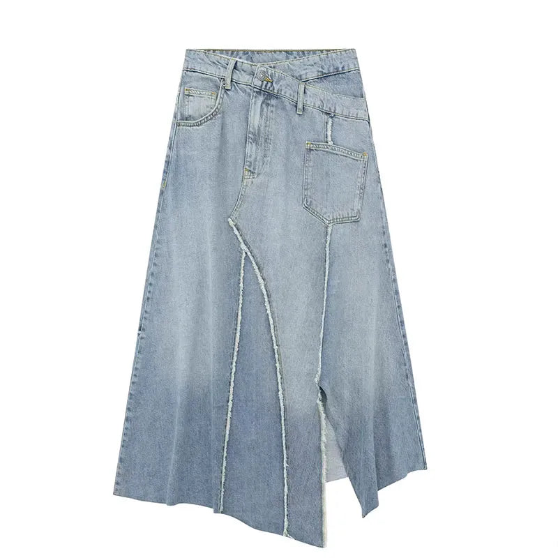 Light blue denim skirt with an asymmetric waistband, patch pocket, frayed seams, and an irregular hem, front view.