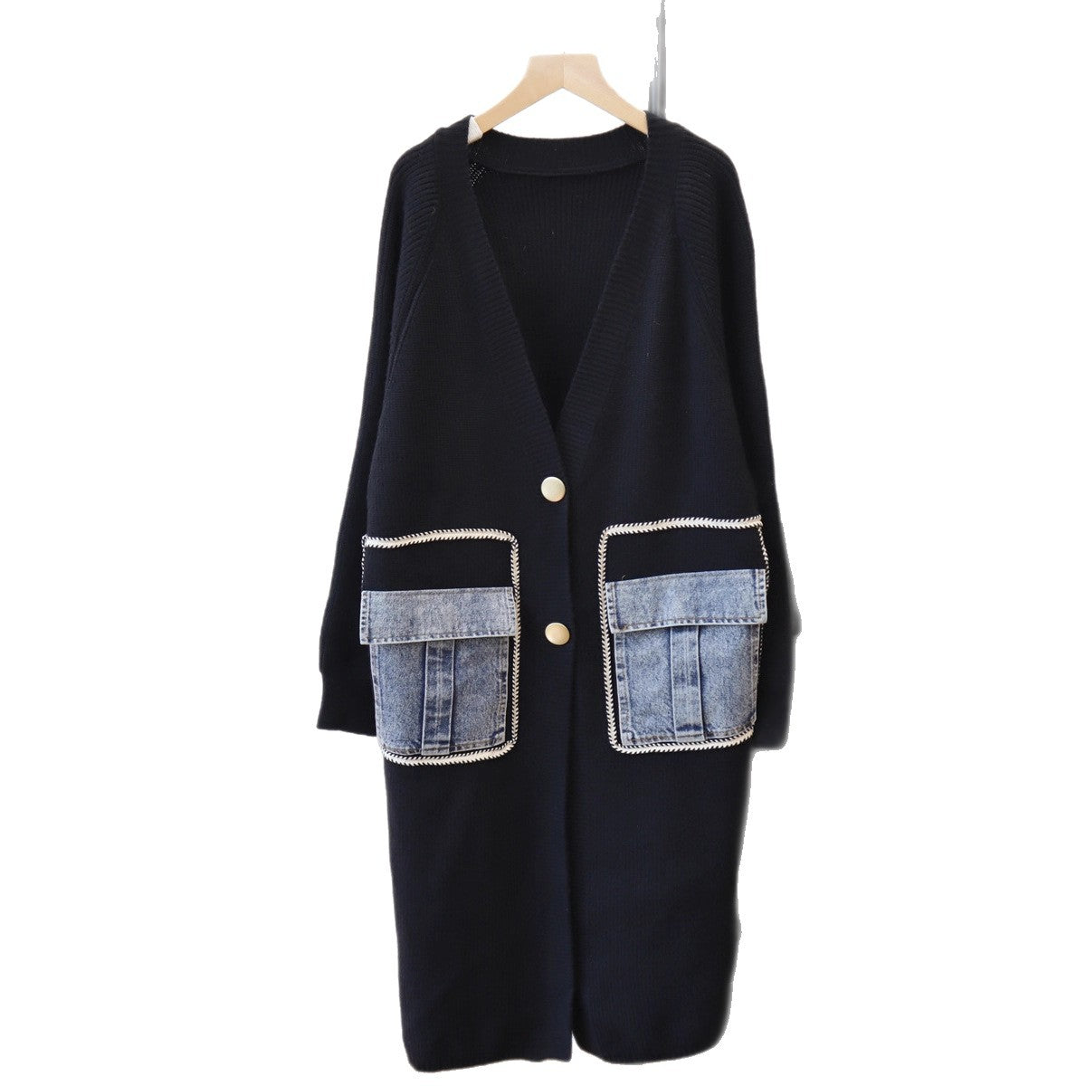 Black longline V-neck cardigan with gold buttons and contrasting blue denim flap pockets, hanging front view.