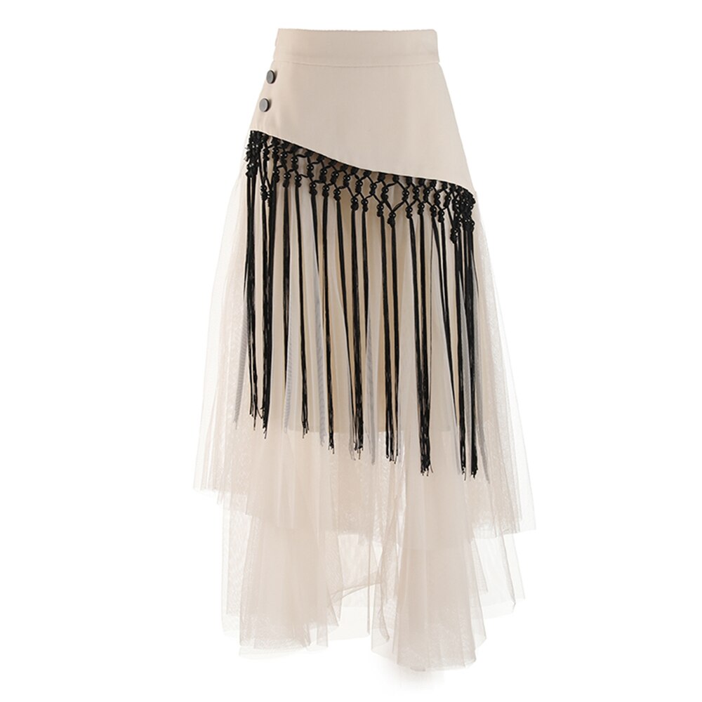 Cream asymmetric layered mesh skirt with black knotted fringe and two side buttons, front view.