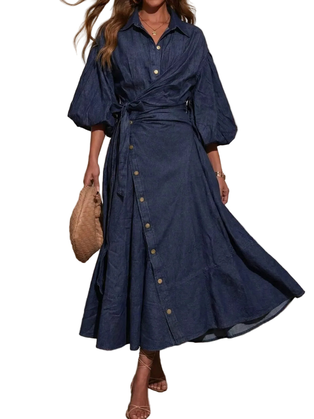 Model wearing a dark blue denim wrap-front shirt dress with balloon sleeves, buttons, and a waist tie.
