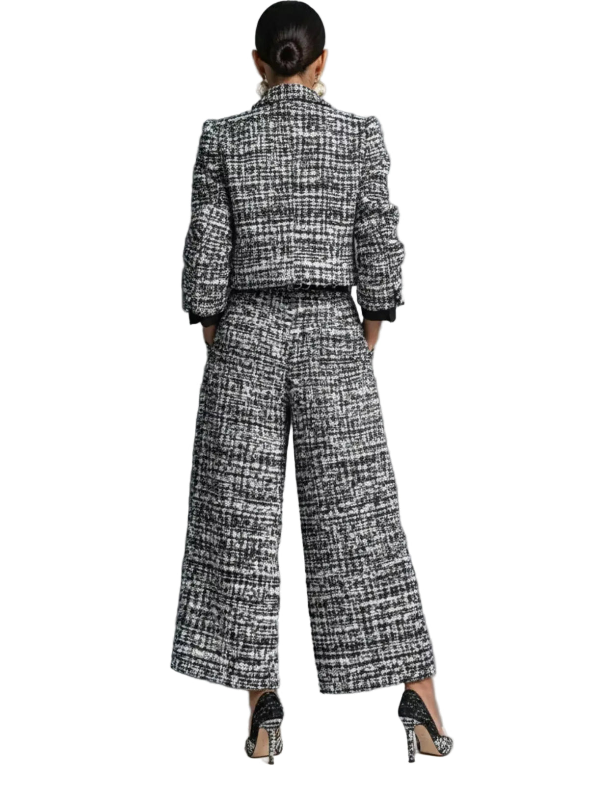 Back view of a black and white textured cropped jacket and matching wide-leg cropped pants.