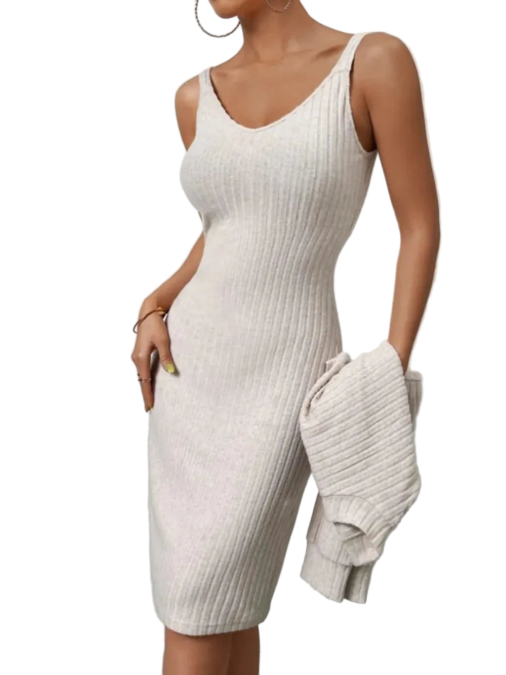 Model wearing a cream ribbed sleeveless scoop-neck dress and carrying its matching cropped sweater.