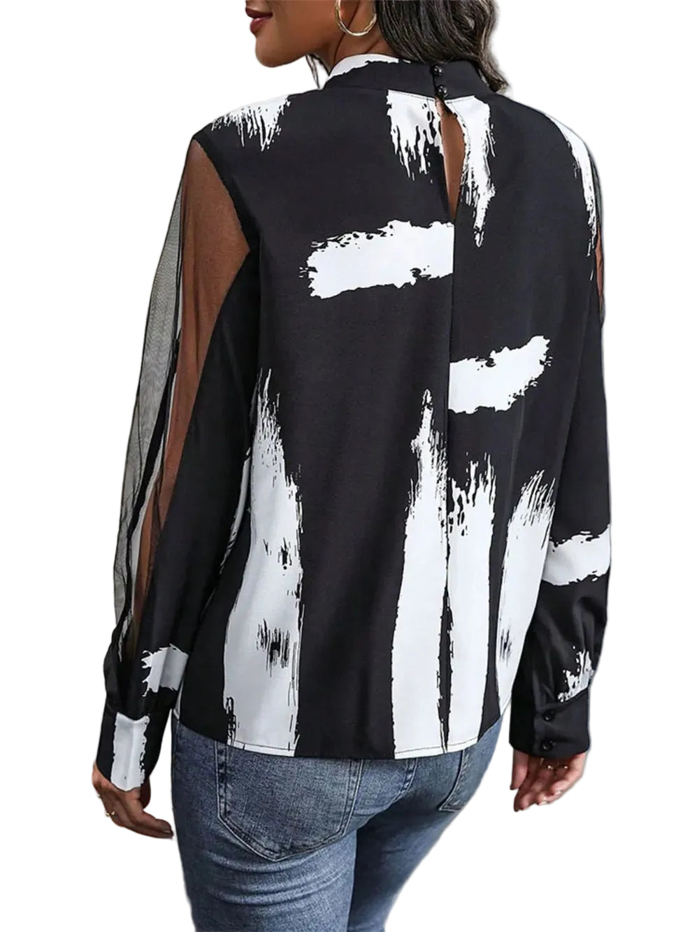 Back view of a black and white brushstroke blouse with a keyhole neck opening and sheer sleeve panels.